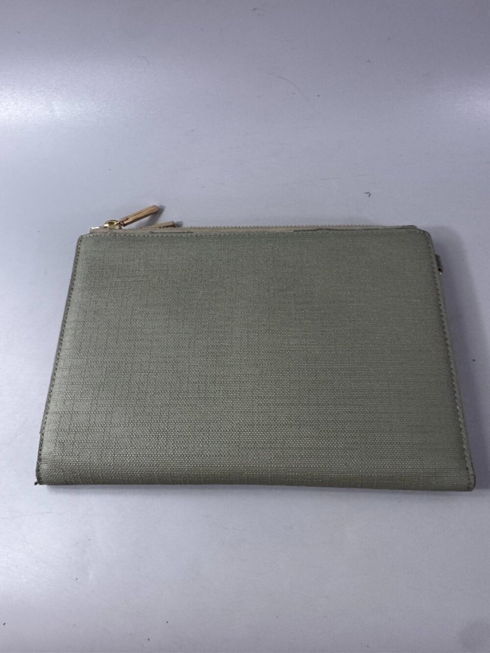 Dagne Dover green leather clutch